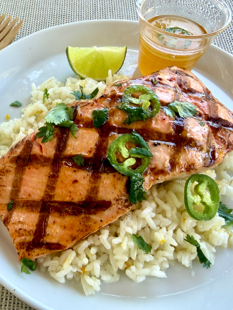 Grilled California King Salmon fillet brushed with honey jalapeno sauce.