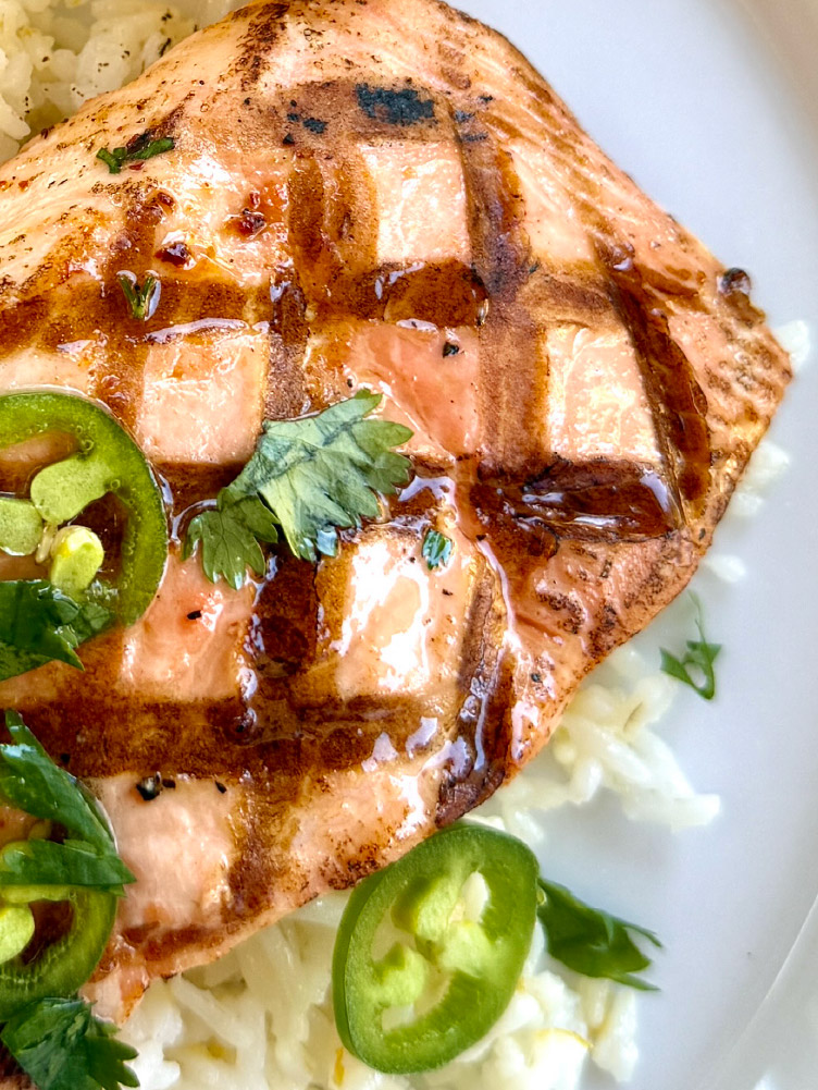 California King Salmon served with honey jalapeno glaze, citrus wedges, and fresh cilantro.
